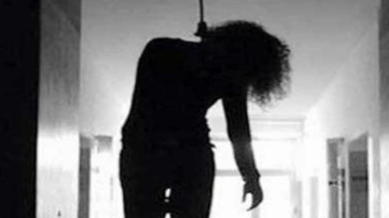 A newly-married woman, who is an officer in the State Bank of India (SBI), committed suicide by hanging herself to the ceiling fan in her house at Marripalem Vuda layout under the airport police station limits in the city on Wednesday night.