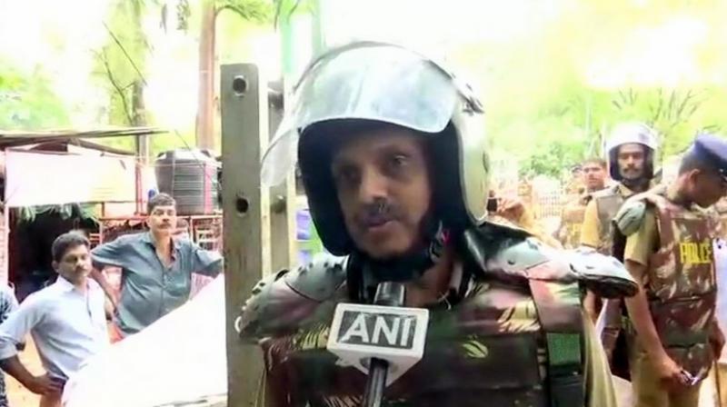 I am also an Ayyappa devotee, IG S Sreejith said while negotiating for the two women. (Photo: Twitter | ANI)