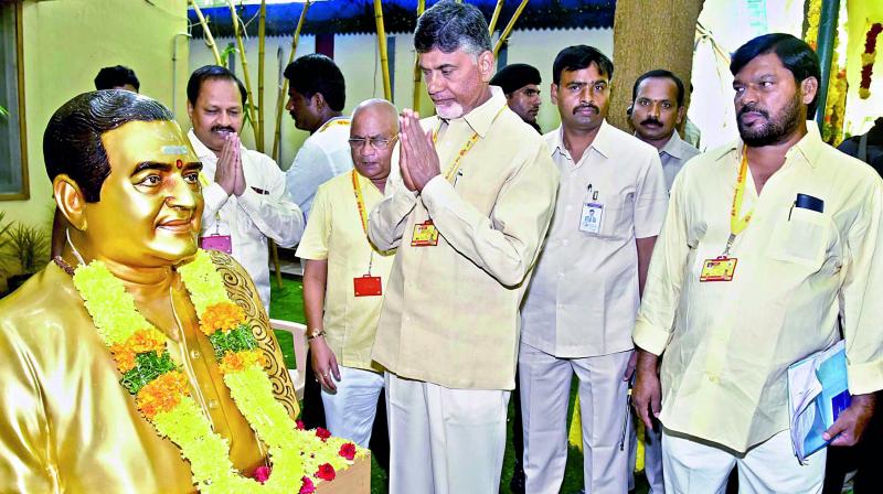 Chief Minister N. Chandrababu Naidu pays tributes to TD founder N.T. Rama Rao  during the Center for Leadership Excellence programme on Monday. (Photo: DC)