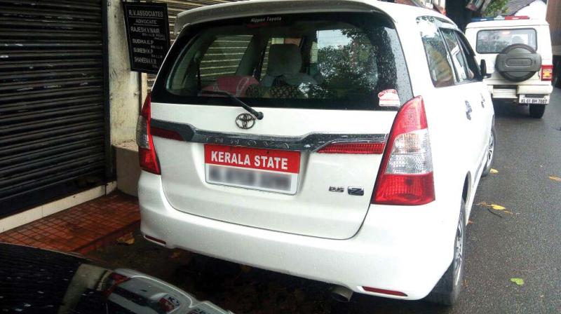 The car  belonging to MarketFed MD facing action for violating the rules of banning the use of Kerala State board.