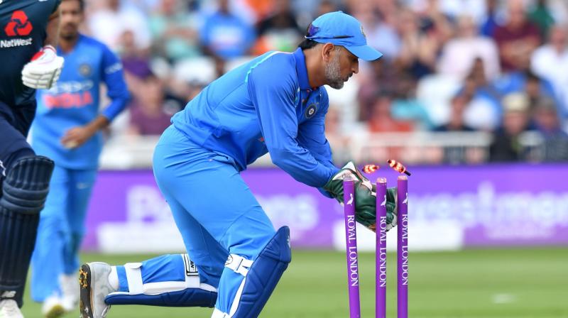 Indias wicketkeeper-batsman Mahendra Singh Dhoni once again played a slow-paced innings of 42 runs from 66 balls, but his masterclass behind the wickets was still evident. (Photo: AFP)