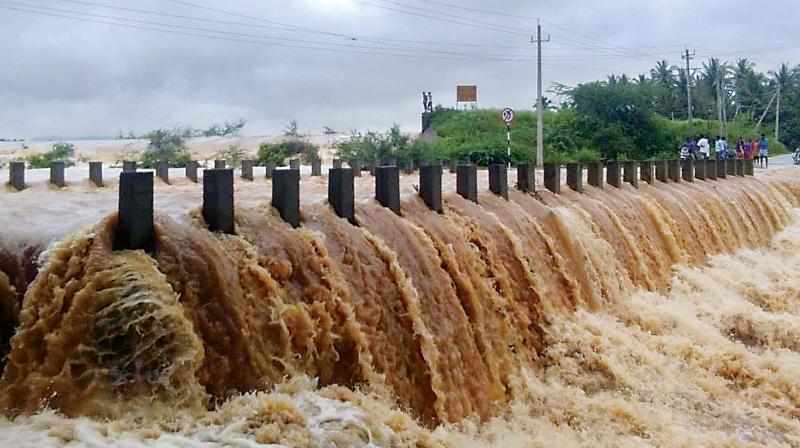 A bridge submerged near Tarikere as heavy rain continued to lash Chikkamagaluru district. (KPN)