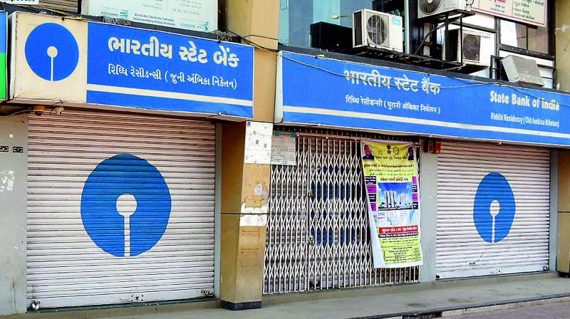 A closed branch of SBI as bank employees went on a nation-wide strike in Surat on Tuesday (Photo: AP)