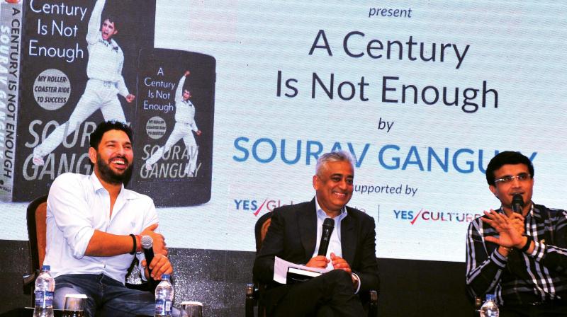 Cricketer Yuvraj Singh and TV journalist Rajdeep Sardesai share a light moment with Sourav Ganguly at the launch of his book A Century is not Enough in New Delhi (Photo: DC)