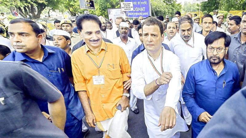 Congress president Rahul Gandhi with other leaders during Bharat Bandh protest in New Delhi.  (Photo: PTI)