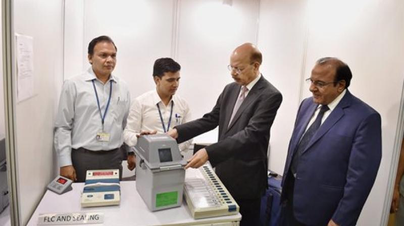 Chief Election Commissioner Nasim Zaidi along with Election Commissioner A K Joti demonstrating the working of Electronic Voting Machines (EVMs) and Voter Verifiable Paper Audit Trail System (VVPATs), while brushing aside the EVM tampering allegation. (Photo: PTI)