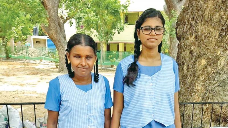 The topper of Little Flower Convent (LFC)Higher Secondary school for blind, M.Vinitha (456/500) along with the second ranker, M.Swetha (449/100). (Photo: DC)