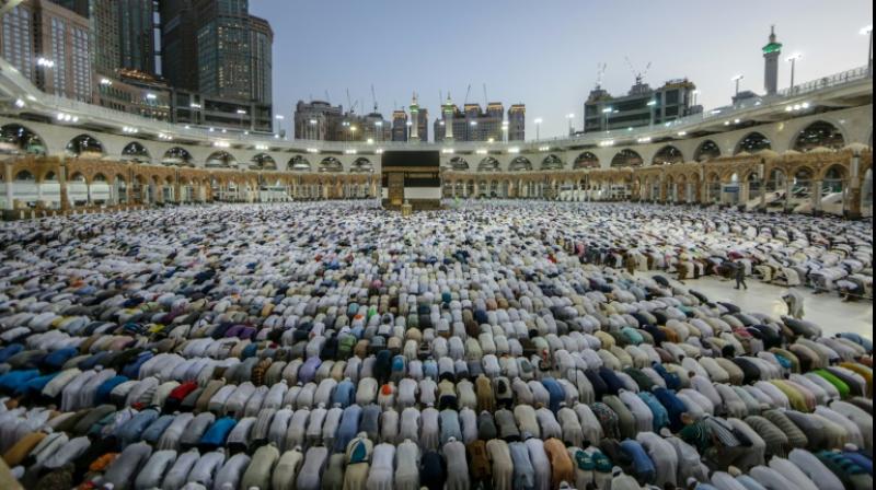 Muslim hajj pilgrims ascend Mount Arafat for day of worship