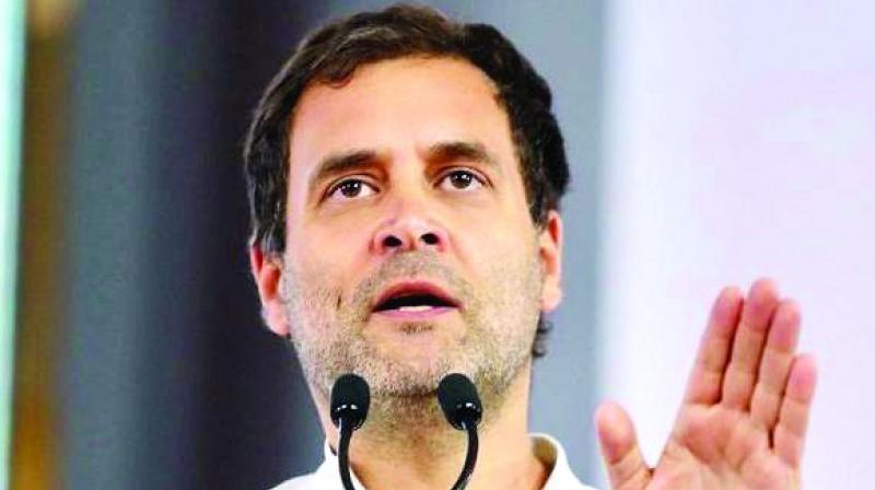 Congress President Rahul Gandhi addresses a press conference in New Delhi on Friday.  (PTI)