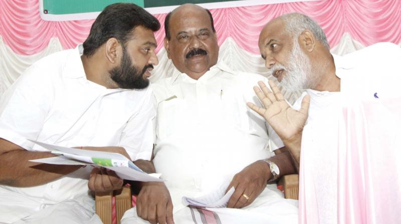 NDA candidate N.Hari, LDF candidate Mani C Kappan and UDF candidate in a function organised by INFAM at Pala in Kottayam on Wednesday. (DC)