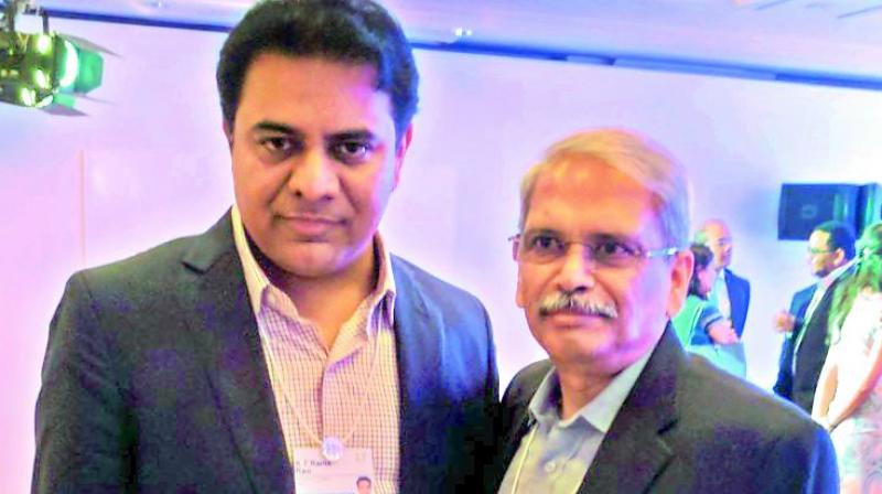 Minister K.T. Rama Rao with Infosys co-founder Kris Gopalakrishnan at the India Economic Summit of the World Economic Forum in New Delhi.