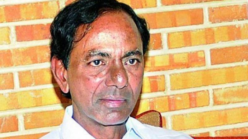 KCR under fire for getting photo, party logo carved in Laskshmi Narasimha temple