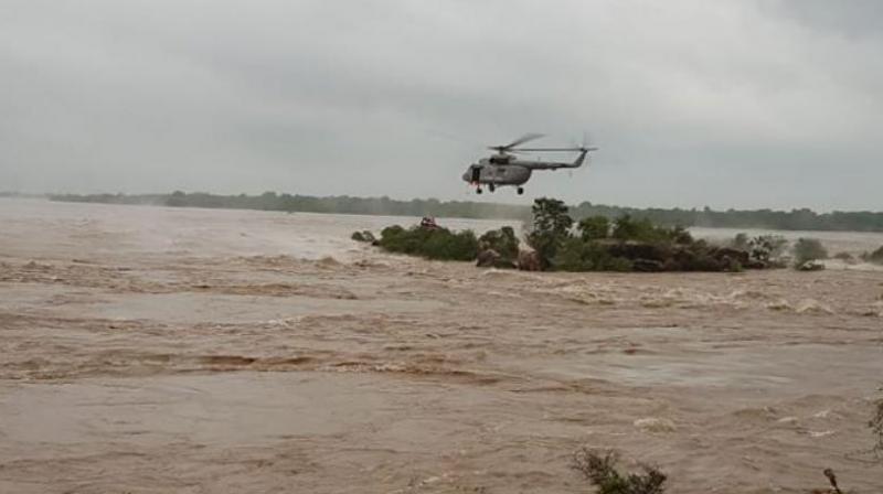 The IAF personnel rescued 14 people stranded in Lalitpur and Jhansi districts due to heavy rainfall, drawing praise from Uttar Pradesh Chief Minister Yogi Adityanath. (Photo: Twitter | @IAF_MCC)