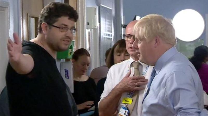 You come for press opportunity: Sick child\s parent confronts UK PM at hospital