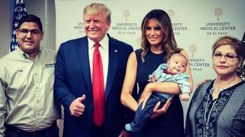 Trumpâ€™s thumbs-up photo with orphaned baby in El Paso sparks controversy