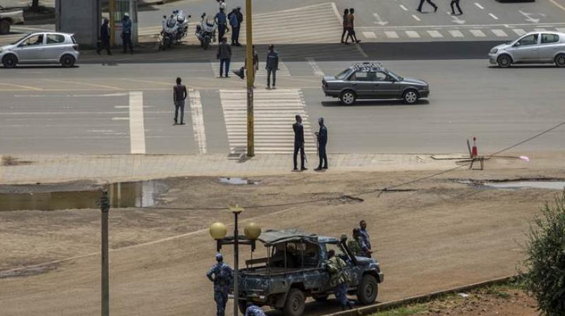 Security forces stand guard in Meskel Square in central Addis Ababa, Ethiopia Sunday. Ethiopias government foiled a coup attempt in a region north of the capital and the countrys military chief was shot dead. (Photo: AP)