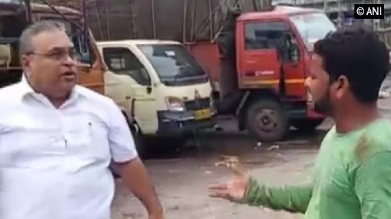 Watch: Sena corporator Milind Vaidya assaults chicken traders over \parking issue\