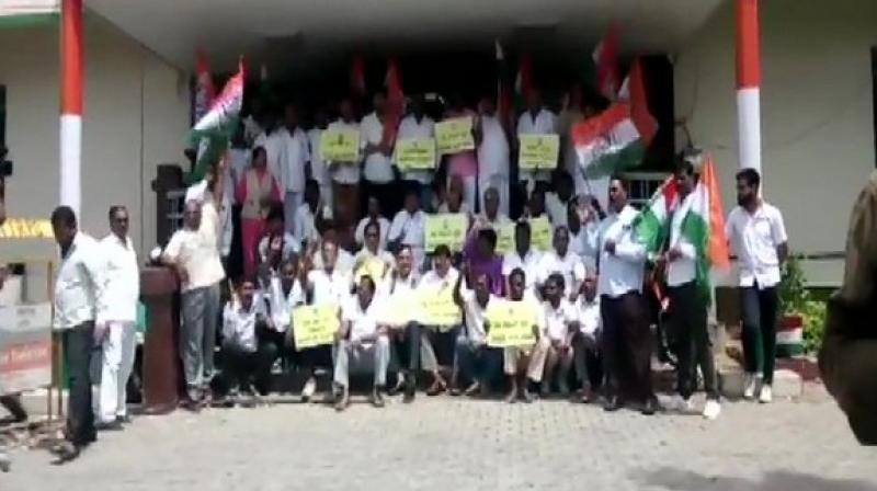 Amid turmoil, Congress workers hold protest outside Bengaluru party office