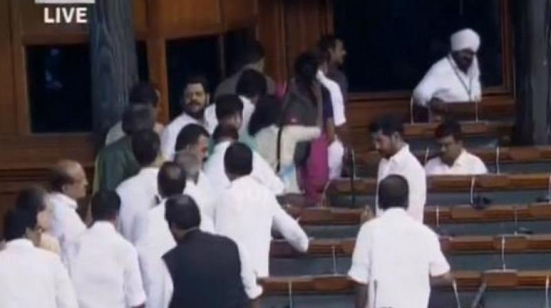 Congress, DMK stage walk out in Lok Sabha on Karnataka developments