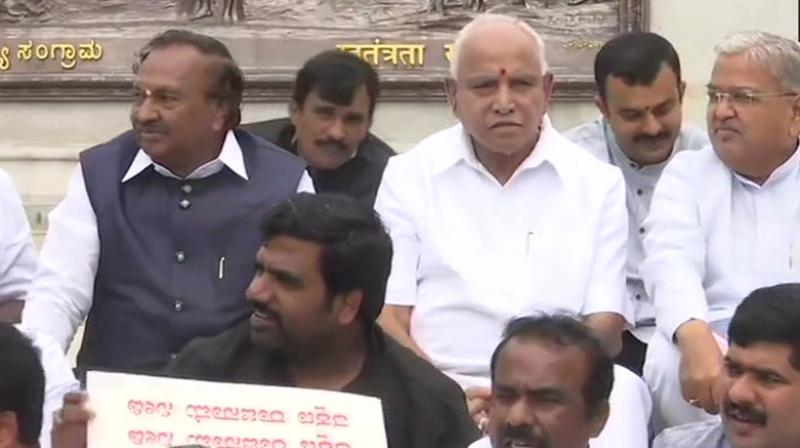 BS Yeddyurappa and other BJP leaders sit on dharna outside Vidhana Soudha
