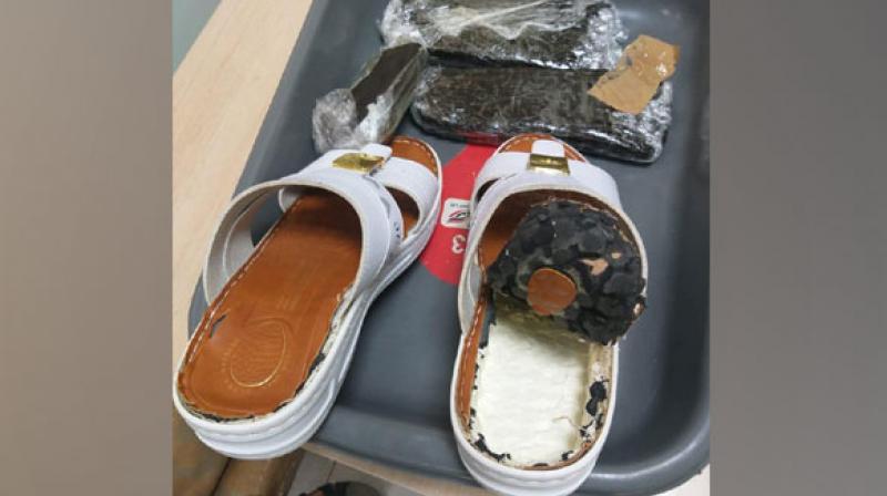 Passenger nabbed at Kerala\s Kannur airport with narcotics hidden in slippers