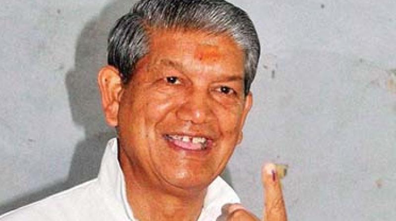 Congress will decide new PM after LS polls results: Harish Rawat