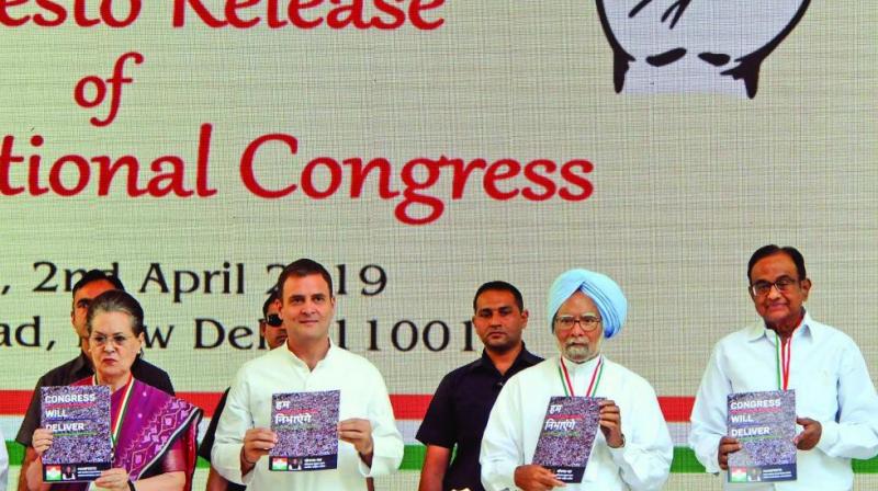 UPA chairperson Sonia Gandhi, Congress chief Rahul Gandhi, former PM Manmohan Singh and former Union minister P. Chidambaram release the partys manifesto for the upcoming general elections in New Delhi on Tuesday. (Photo: G.N. JHA)