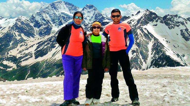 Karthikeyan with wife Lavanya and daughter Kaamya at the Mt. Elbrus.
