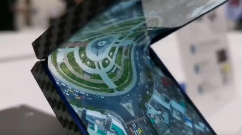 Watch Sharpâ€™s vertically folding phone in action