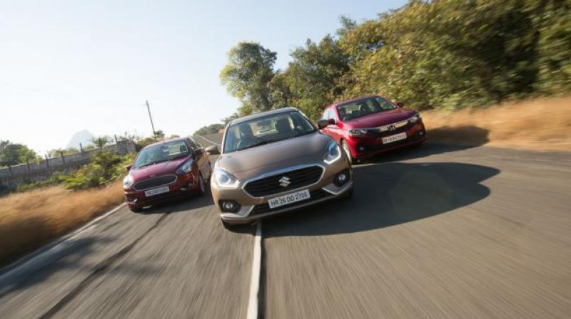 Is the Maruti Dzire petrol more frugal than Honda Amaze and Ford Aspire?