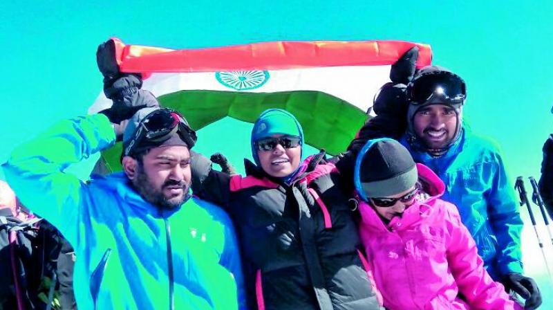 Vijayawada Adventure Club members Raghunath, Satya Rao and others created record by  climbing mount Elvrus and displaying 50-feet tri-coluor on Thursday. (Photo: DC)