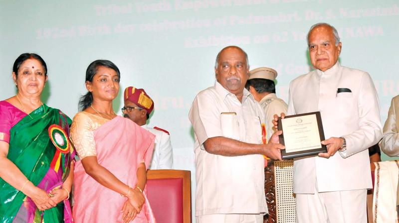 Use state schemes to move up the ladder: Guv tells tribals