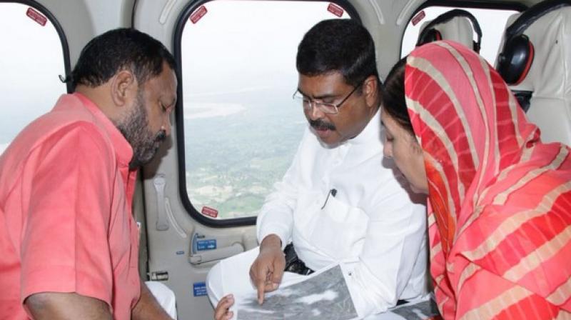 Dharmendra Pradhan undertakes aerial survey of flood-hit areas in Odisha