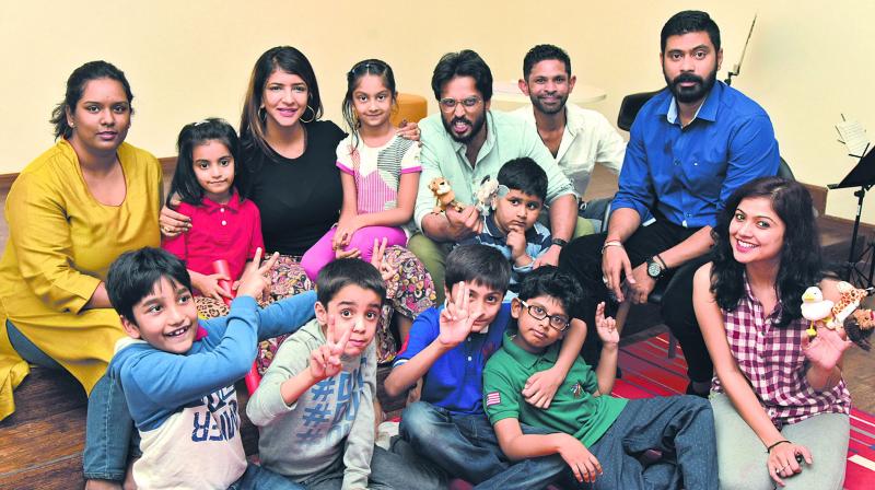 Priya Venkat, Lakshmi Manchu, Aadarsh Balakrishna, Taher Ali Baig and Sakshi Chaturvedi with children from the New York Academy, who are part of the play.