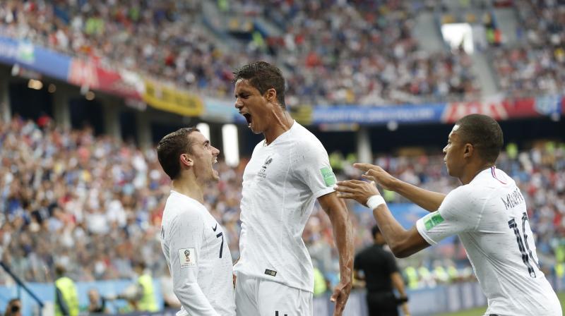 A Raphael Varane header put France in front as they take 1-0 lead at the mid-match break. (Photo: AP)
