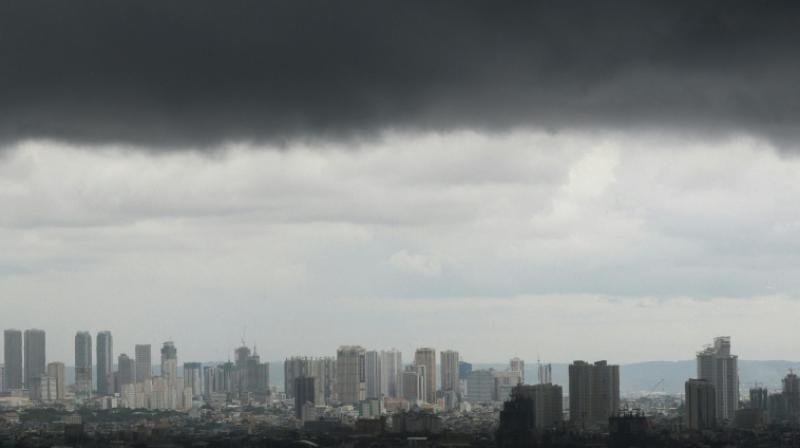 Dark storm clouds in August hang over Manila in the Philippines, which are often the first major landmass to be hit by storms that generate over the Pacific Ocean. (Photo: AFP)