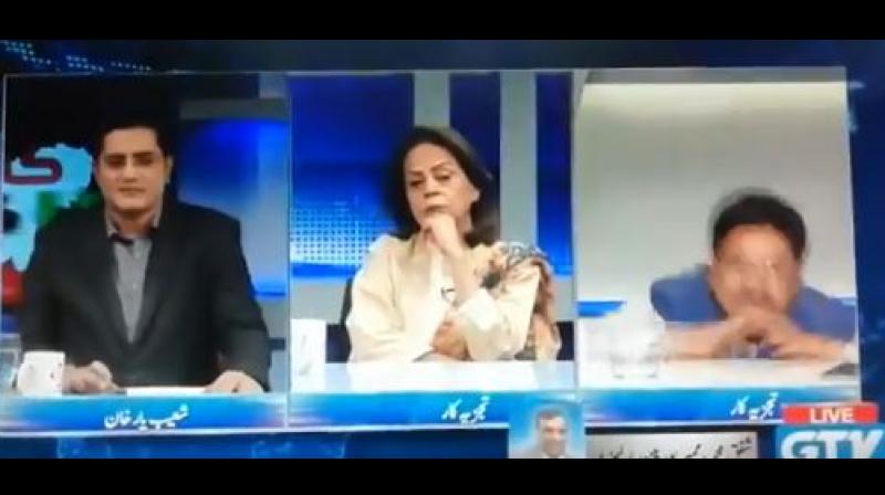 Watch: Pak analyst falls of his chair during live TV debate on Kashmir