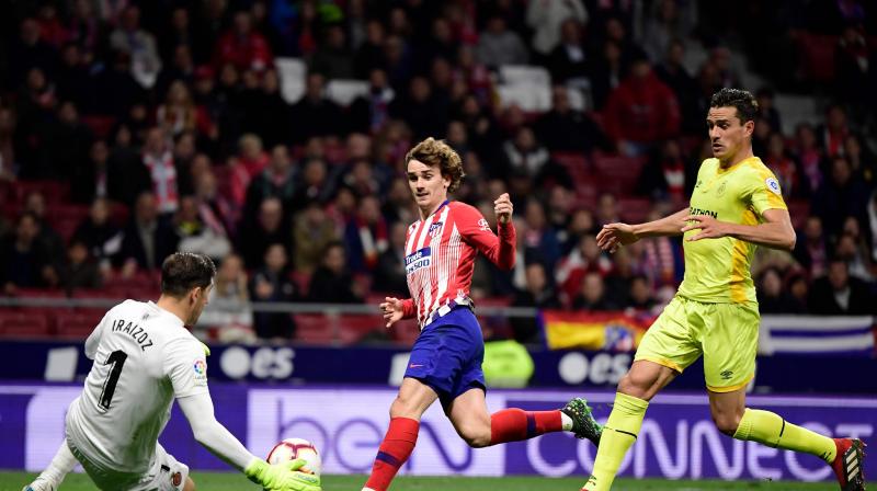 La Liga: Godin, Griezmann strike late goals as Atletico wins 2-0 vs Girona