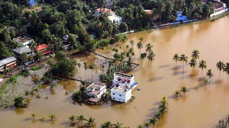 An aerial view of the flooded locality of Aluva after heavy rains, in Kerala. (Photo: PTI)