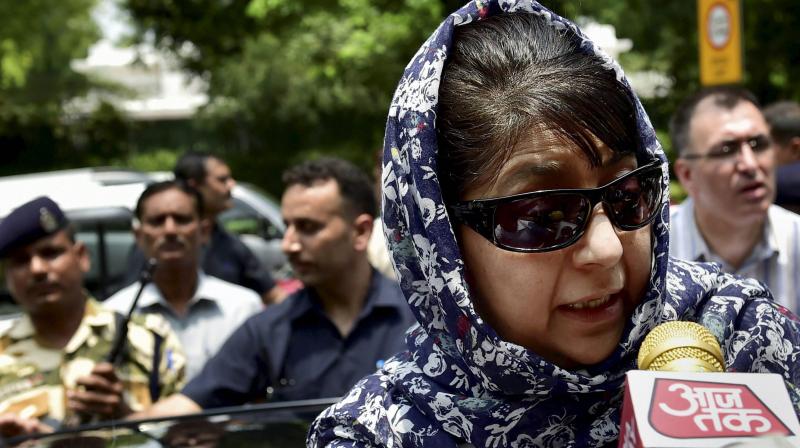 Jammu and Kashmir Chief Minister Mehbooba Mufti speaking with reporters after meeting Home Minister Rajnath Singh at his residence in New Delhi on Saturday. (Photo: PTI)
