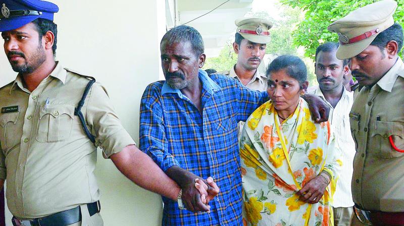 Katta Venugopal alias Khal Nayak and wife K. Lakshmi being taken before mediapersons at Suryaraopet PS in Vijayawada on Saturday. (Photo: DC)