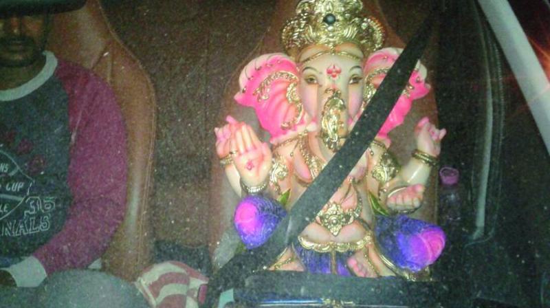 A pictures of Vinayakudu wearing a seat belt has gone viral on Thursday in Hyderabad. (Photo: DC)