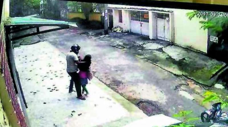 CCTV image shows the girl fighting with the accused.