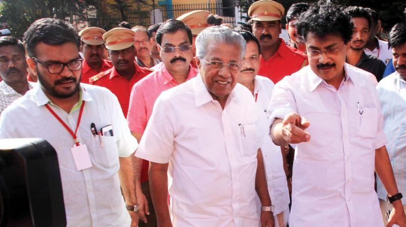 Chief Minister Pinarayi Vijayan arrives at CPM Palakkad  district conference on Friday. M.B. Rajesh, MP, is also seen. (Photo: DC)