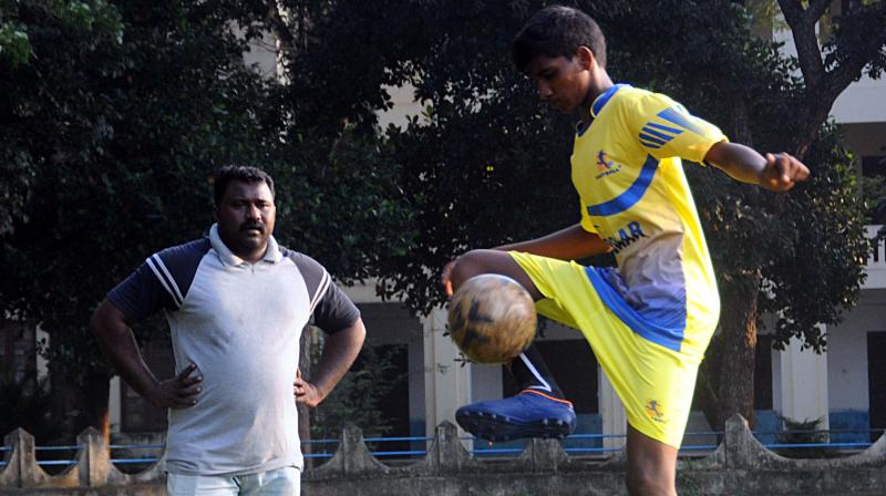 Manikantan with his coach.