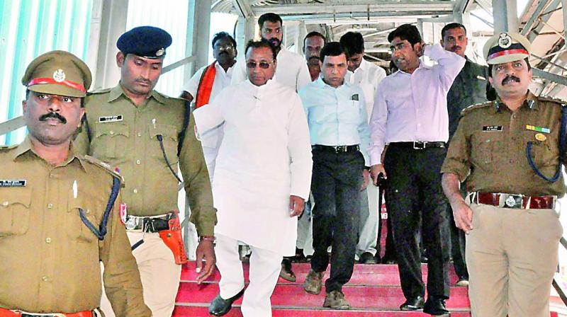 South Central Railways divisional regional manager R. Dhananjayulu and Nellore MP M. Raja Mohan Reddy inspecting railway station in Nellore city on Monday. (Photo: DC)