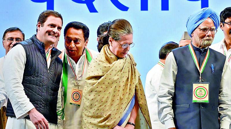 Congress president Rahul Gandhi with chairperson CPP Sonia Gandhi and former Prime Minister Manmohan Singh during the 84th plenary session of INC. (Photo: PTI)