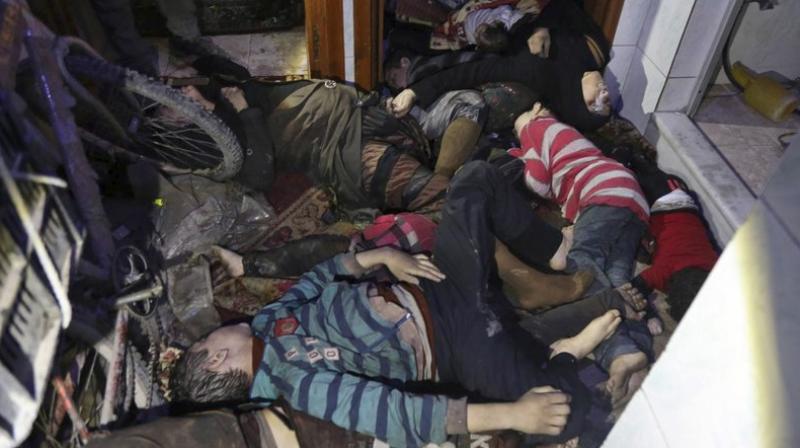 The image released early on Sunday by the Syrian Civil Defense White Helmets, shows victims of an alleged chemical weapons attack collapsed on the floor of a building in the rebel-held town of Douma, near Damascus, Syria. (Photo: AP)