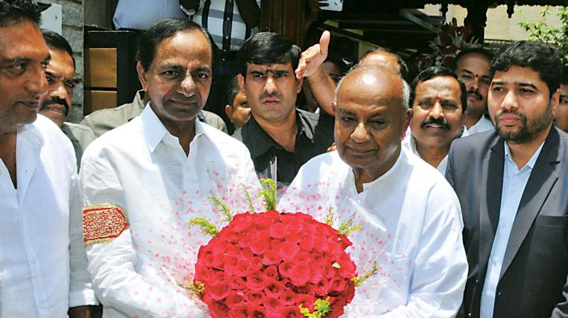 Telangana Chief Minister K. Chandrasekhar Rao with former Prime Minister and JD(S) supremo H.D. Deve Gowda in Bengaluru on Friday. (Photo: KPN)