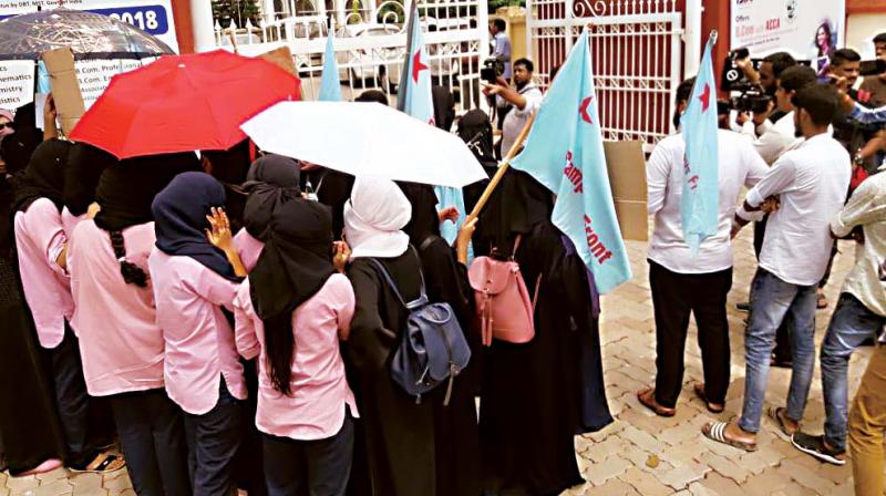 Muslim girl students of St Agnes College in Mangaluru protest demanding that they be allowed wear hijab.